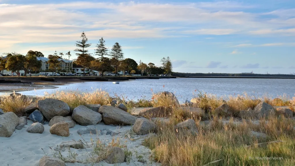 Wynnum Foreshore, Brisbane – tidal pool, calm bay waters and parklands at sunset