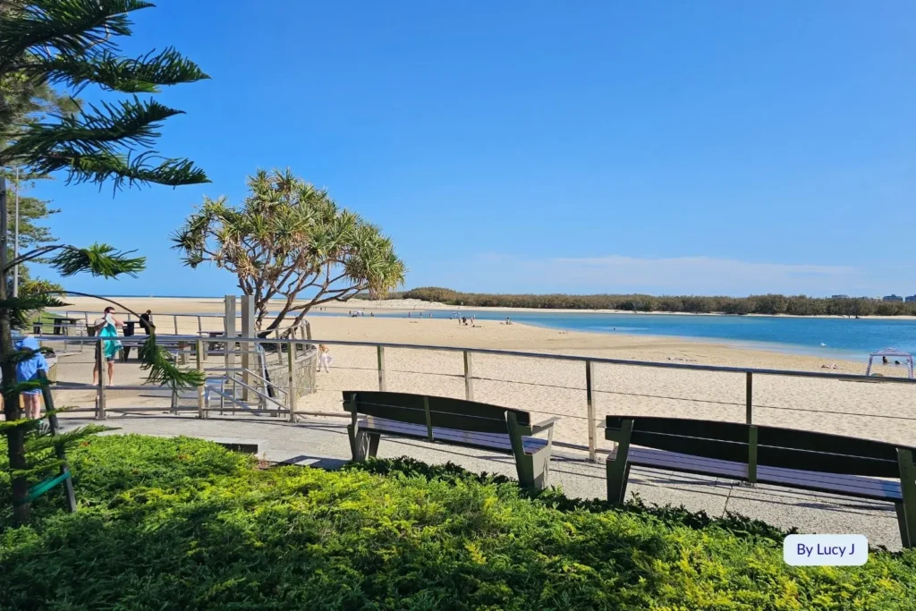 Scenic benches overlooking the calm waters of Pumicestone Passage at Bulcock Beach, Caloundra, Sunshine Coast, Queensland.