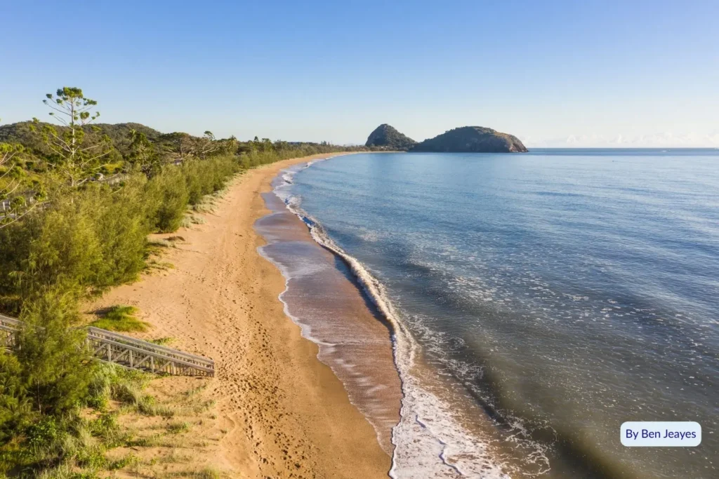 Aerial view of Kemp Beach and Bluff Point near Yeppoon, Queensland, showing golden sand and calm blue water along the Capricorn Coast.