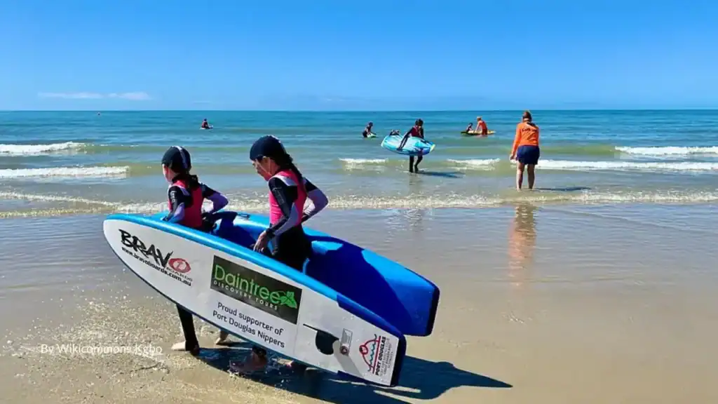 Children enjoying Four mile beach swimming