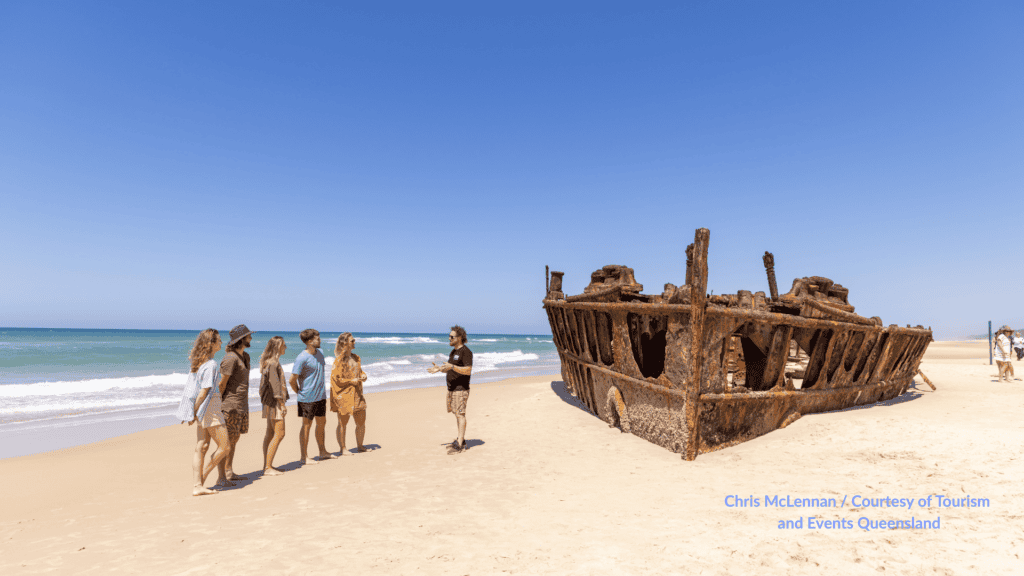 Tour group at the Maheno shipwreck on 75 Mile Beach K'gari Queensland