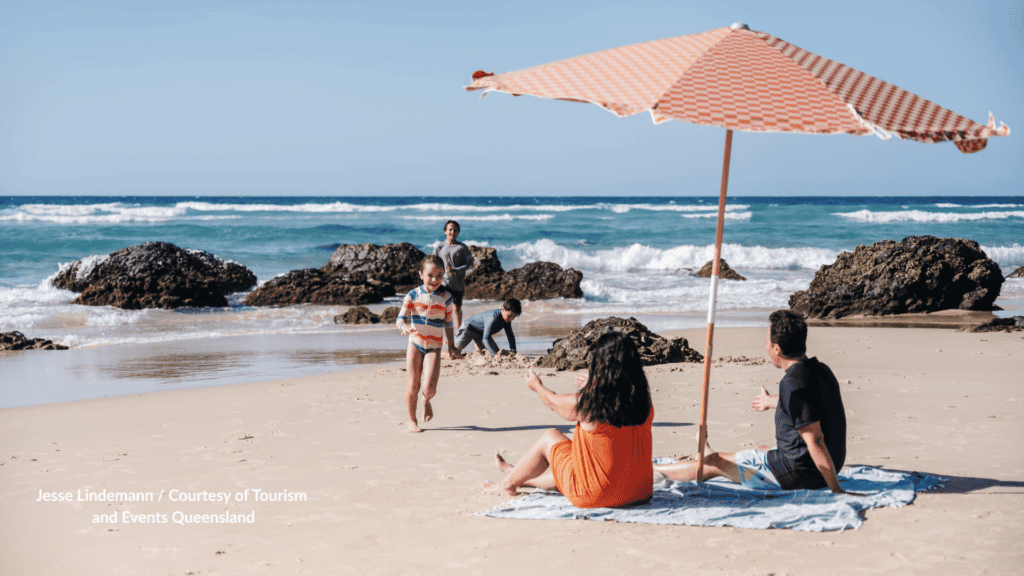 Family at the rock pools on Kirra Beach Gold Coast Queensland