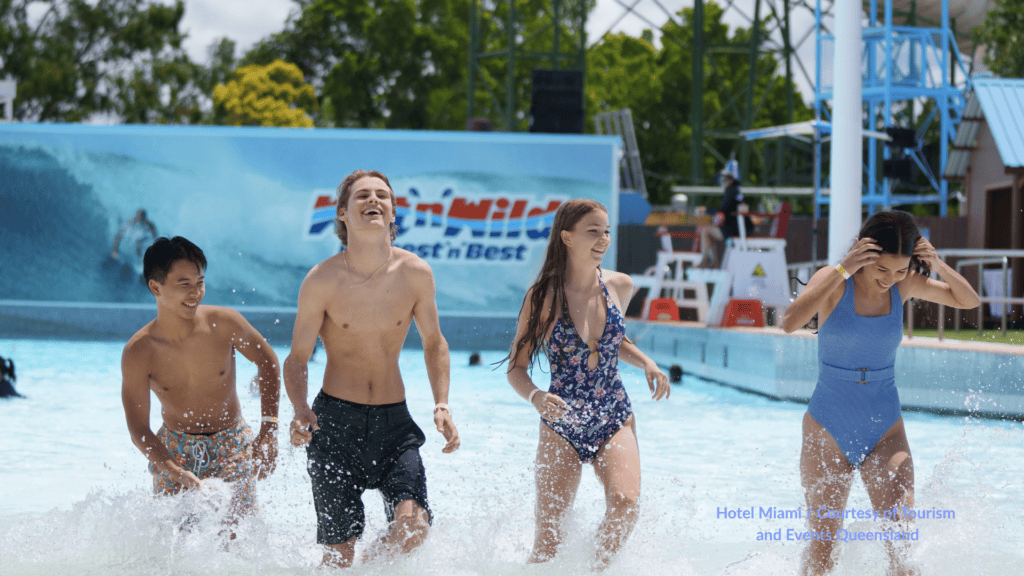 Teenagers enjoying the water slides at a theme park on the Gold Coast Queensland