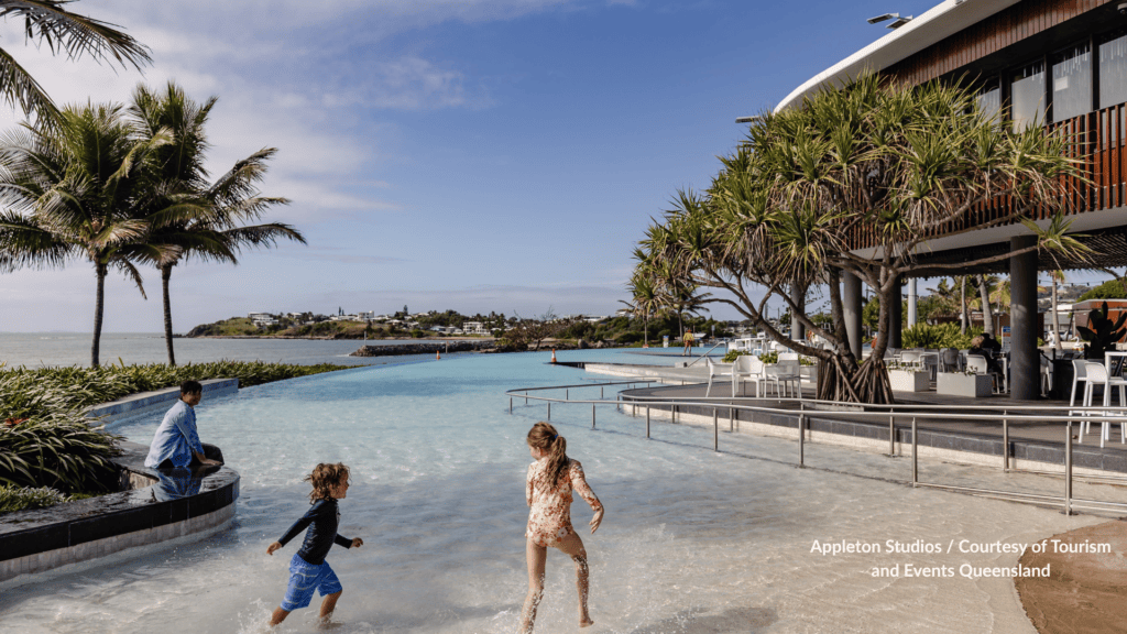 Children playing in the shallow water at Yeppoon Lagoon Queensland