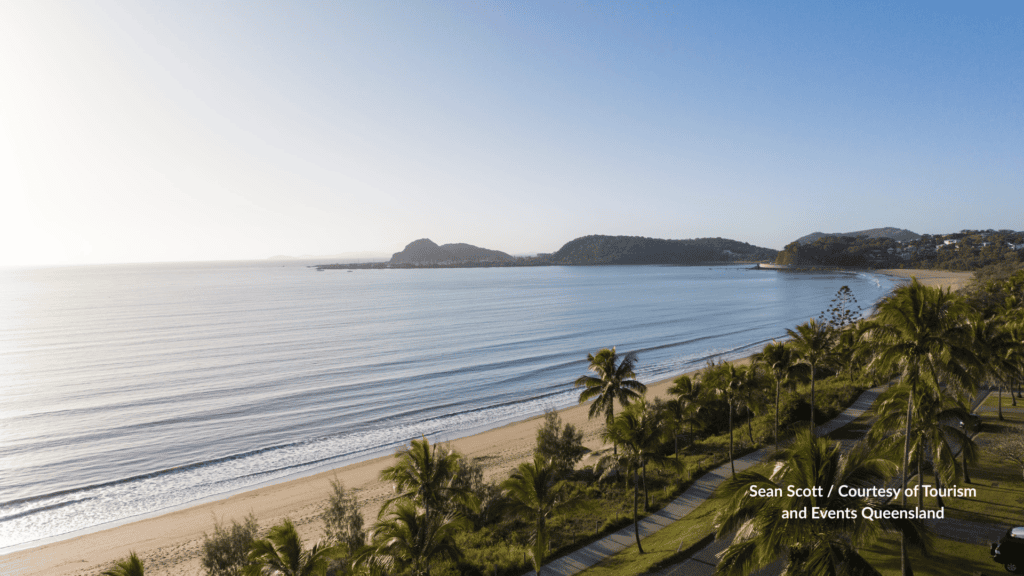 Lammermoor Beach at sunrise with palms and headlands near Yeppoon Queensland